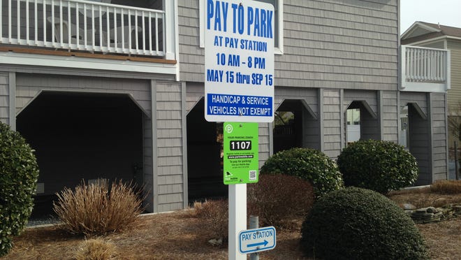 Parkmobile signs, as seen in Bethany Beach, will pop in Dewey Beach in time for the tourist season.