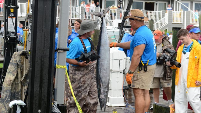 The Hog Wild brought in a 55 pound Wahoo caught by Gary Capuano on the first day of The White Marlin Open at Harbour Island Marina in Ocean City, Md. on Monday, August 7, 2017.