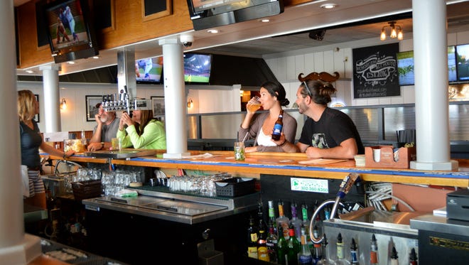Guests enjoying themselves at the newly renovated Rehoboth Ale House on Wilmington Avenue in Rehoboth Beach.