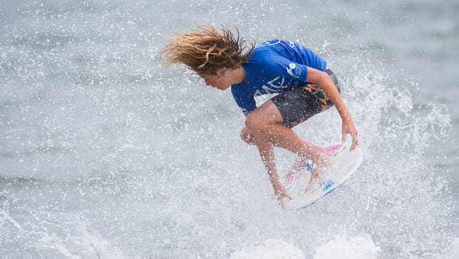 Ethan Redefer of Rehoboth, Del., competes in the semi pro division at the Zap Pro/Amateur World Championships of Skimboarding at Dewey Beach.