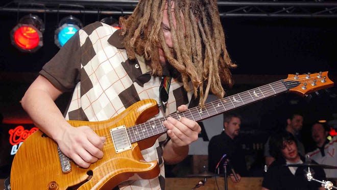 SOJA's Trevor Young performs with his old band, Seaford's Chowderfoot, at the Delaware Music Festival at The Rusty Rudder in Dewey Beach in 2008.