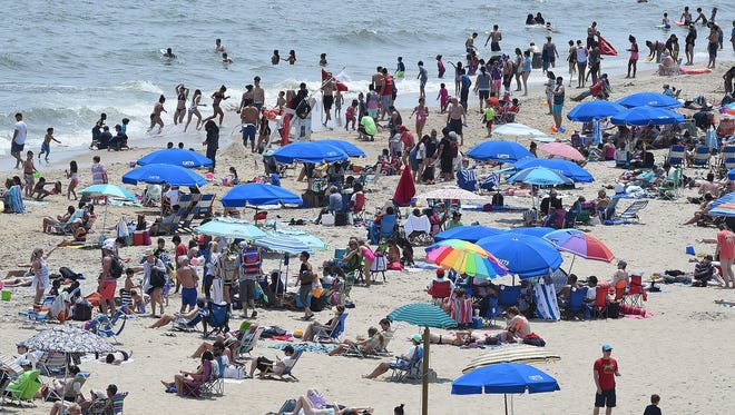 Last year, cool weather kept visitors out of the water in Rehoboth Beach. But there was crowd on the beach and boardwalk.