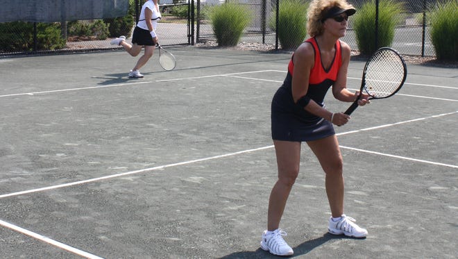 Two visitors play doubles on the tennis courts at the Sea Colony Resort in Lewes.

Photo by Andrew Leary, Sea Colony marketing coordinator