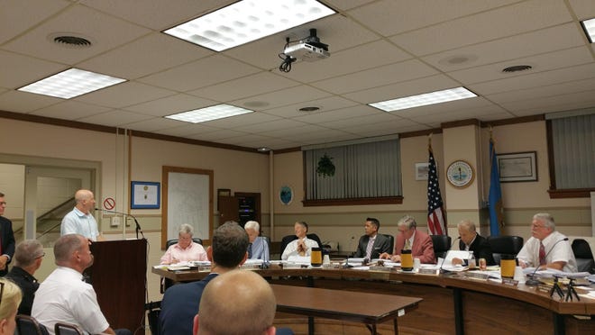 Dogfish Head CEO Nicholas Benz speaks to the Rehoboth Beach Board of Commissioners on Aug. 22 about his plans to rebuild Dogfish Head Brewings & Eats in town.