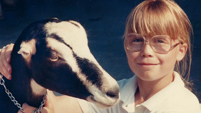 1990: Jennifer Shaw, 10, of Sudlersville, Md., with her first-place winning goat in the children ' s 13 and younger competition. See more vintage images of the Delaware State Fair.