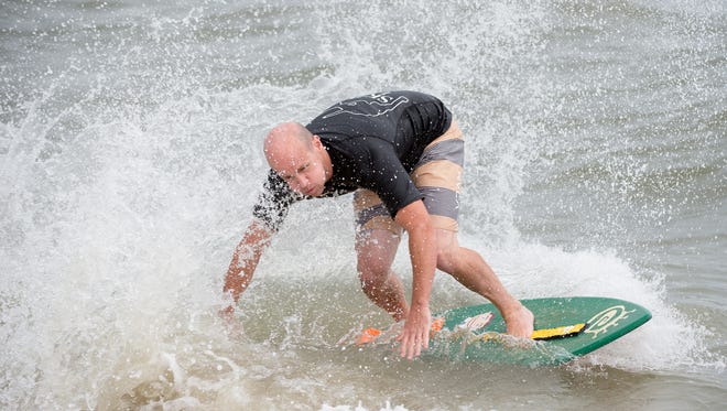 John Hall of Spring Lake Heights, N.J., competes in the senior grandmaster division at the Zap Pro/Amateur World Championships of Skimboarding at Dewey Beach.