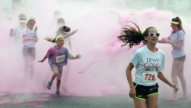 The 2nd Annual Dewey Color Run, part of the Ten Sisters Road Race Series, was held in Dewey Beach on Saturday June 6, with several hundred entrants participating in a non-competitive run/walk that had six color stations along the way. The event benefits the Southern Delaware Therapeutic Riding Association.