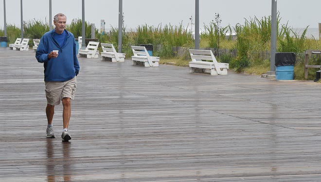 A morning walk turned a little wet and salty on the Rehoboth Beach boardwalk Tuesday morning.