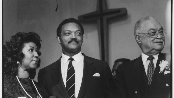 Aretha Franklin and Jesse Jackson join Detroit Mayor Coleman Young at a rally for the Mayor in New St. Paul Tabernacle Church of God in Christ on Nov. 3, 1989.
