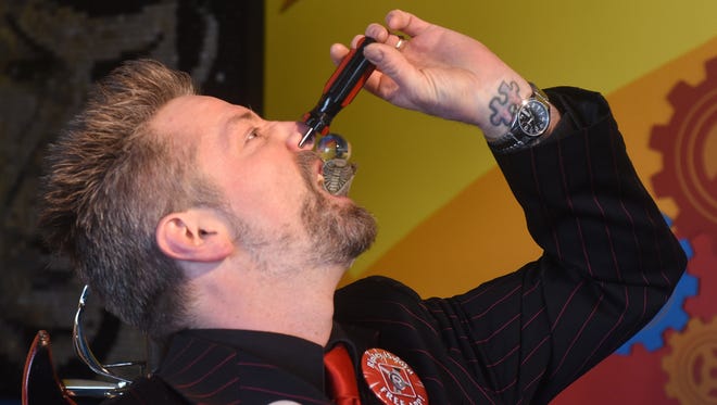 Don't try this at home! Tyler Fyre shoves a screwdriver up his nose at the Odditorium Grand Reopening of Ripley's Believe It or Not! on the Boardwalk in Ocean City Saturday, March 10, 2018.