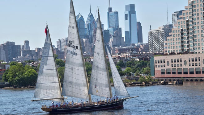The Spirit of Bermuda tall ship sails through the waters of the Delaware River during the Parade of Sails at Penn's Landing, Philadelphia, Thursday, May 24, 2018. The visiting tall ships are part of a three-day Philadelphia and Camden waterfront festival. (Jose F. Moreno/The Philadelphia Inquirer via AP)