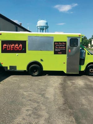 Fuego Food Truck owners Rob Cruz and Phill Hollar will soon open a brick-and-mortar location in downtown Rehoboth Beach.