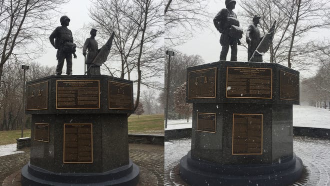 Wilmington's first snow of the year arrived Saturday morning. These photos were taken about three hours apart. Pictured here is a monument in Brandywine Park.