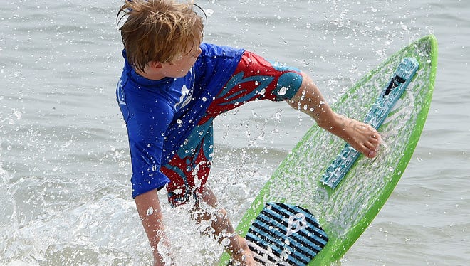 Mini Division competitor Burke Henley does his best as Dewey Beach was the site of the Zap Amateur Skimboarding World Championships held on Saturday & Sunday August 9th and 10th with over 200 competitors from around the world competing in several divisions for the honors.