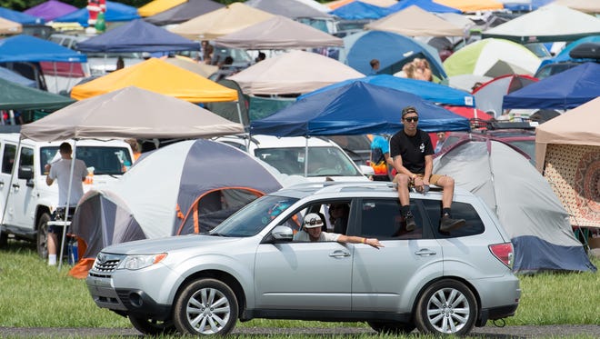 Campers arrival to the Firefly Music Festival in Dover.