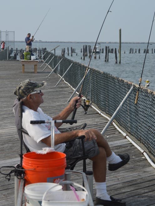 Lenard Ruebeck, of Lewes, waits for a bite at the refurbished Cape Henlopen Fishing Pier.