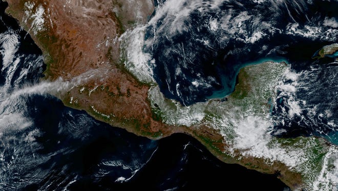This area of Mexico and Central America is seen from GOES-16 with a largely cloud-free view. A fire and its associated smoke are evident over southern Mexico near the coast.