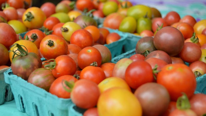 Ripe tomatoes featured at the Rehoboth Farmers Market earlier this summer.