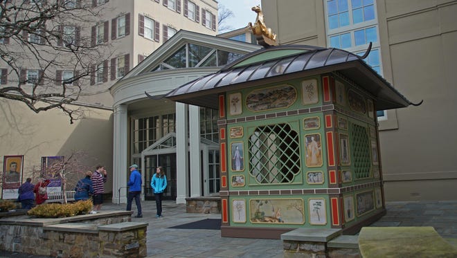 Visitors to Winterthur Museum passby the new Chinese Pavilion Folly in the new follies exhibit.