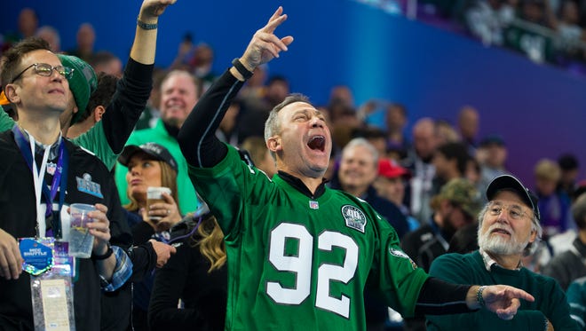 Eagles fans cheer before the start of Super Bowl LII Sunday at US Bank Stadium.