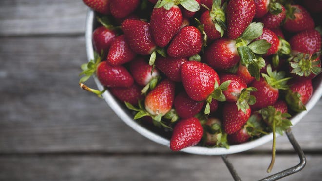 Pick fruit (strawberries, apples or peaches) at a Delaware farm.