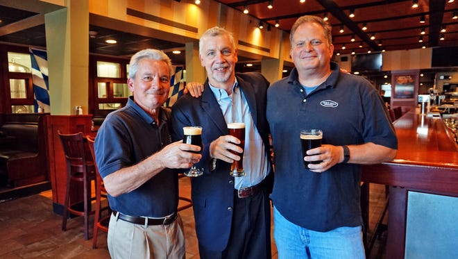 Iron Hill Brewery & Restaurant founders (from left) Kevin Davies, Kevin Finn and Mark Edelson. The trio will expand their brewery and restaurant concept to South Carolina.