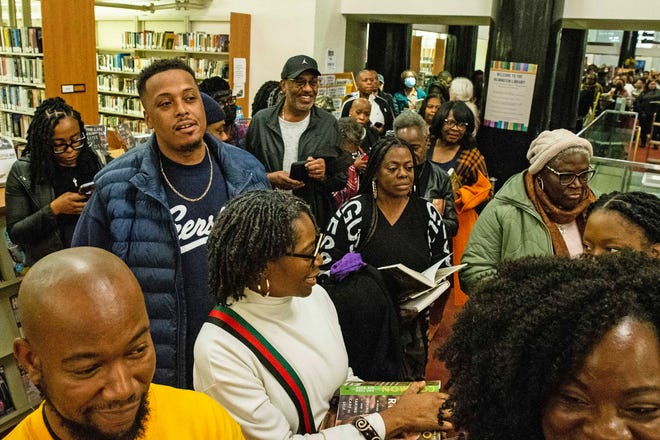 Fans wait in a long line for Common, rapper, actor, writer and activist, to sign his book And Then We Rise: A Guide to Loving and Taking Care of Self at the Wilmington Public Library on Friday, Jan 26, 2024. A capacity crowd of approximately 350 people attended.