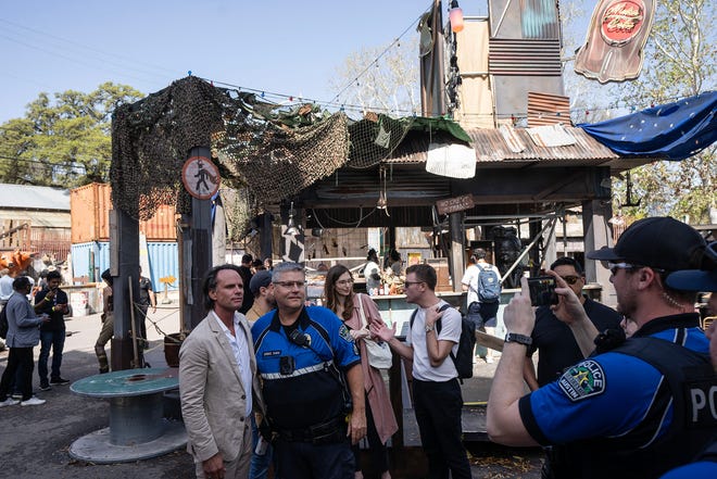 Actor Walton Goggins takes a photo with an Austin Police officer while at Prime Video’s Fallout activation at Hotel San José during SXSW Friday March 8, 2024. The activation features a post-apocalyptic world that promotes Prime Video's new series.