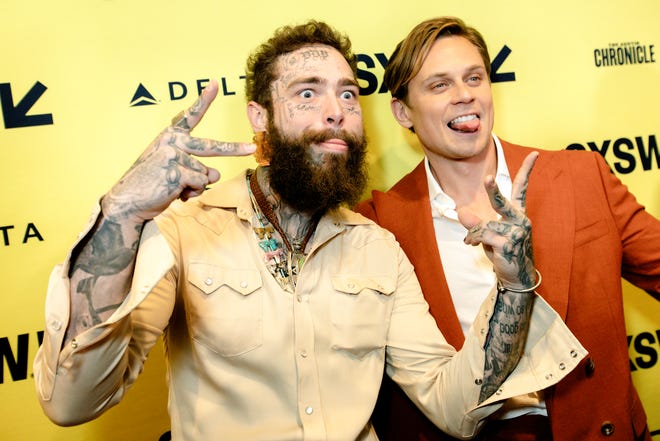 AUSTIN, TEXAS - MARCH 08: (L-R) Post Malone and Billy Magnussen attend the "Road House" World Premiere during SXSW at The Paramount Theater on March 08, 2024 in Austin, Texas. (Photo by Greg Doherty/Getty Images for Amazon MGM Studios)