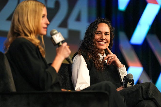 Former WNBA champion Sue Bird, right, listens to TOGETHXR co-founder and chief content officer Jessica Robertson, left, during a keynote speaking event during South by Southwest at the Austin Convention Center on Sunday, March 10, 2024.