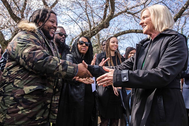 Stephen Marley, son of Bob and Rita Marley, shakes hands with Lieutenant Governor of Delaware Bethany Hall-Long at One Love Park/Tatnall Street Park in Wilmington, Wednesday, March 20, 2024. Marley, who was born in Wilmington and lived at the family's home on 24th Street, was presented with the key to the city by Mayor Purzycki.