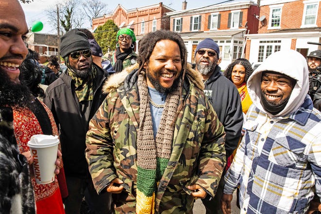 Stephen Marley, son of Bob and Rita Marley, is featured with community members at One Love Park/Tatnall Street Park in Wilmington, Wednesday, March 20, 2024. Marley, who was born in Wilmington and lived at the family's home on 24th Street, was presented with the key to the city by Mayor Purzycki.