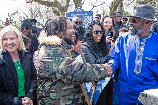 Stephen Marley, son of Bob and Rita Marley, is featured with community members at One Love Park/Tatnall Street Park in Wilmington, Wednesday, March 20, 2024. Marley, who was born in Wilmington and lived at the family's home on 24th Street, was presented with the key to the city by Mayor Purzycki.