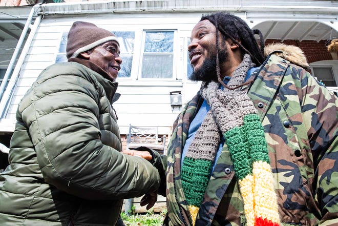 Community members greet with Stephen Marley, son of Bob and Rita Marley, at One Love Park/Tatnall Street Park in Wilmington, Wednesday, March 20, 2024. Marley, who was born in Wilmington and lived at the family's home on 24th Street, was presented with the key to the city by Mayor Purzycki.