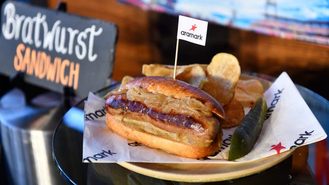 A bratwurst sandwich is displayed during an event to highlight what is new for the 2024 Philadelphia Phillies season at Citizens Bank Park in Philadelphia on Monday, March 25, 2024.