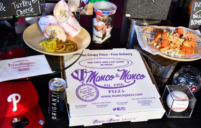 A Manco & Manco pizza box is displayed during an event to highlight what is new for the 2024 Philadelphia Phillies season at Citizens Bank Park in Philadelphia on Monday, March 25, 2024.