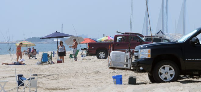 Delaware Seashore State Park attracts surf fishers on July 2, 2012. DNREC has changed its rules for parking on drive-on beaches, requiring people to park in single-file lines.