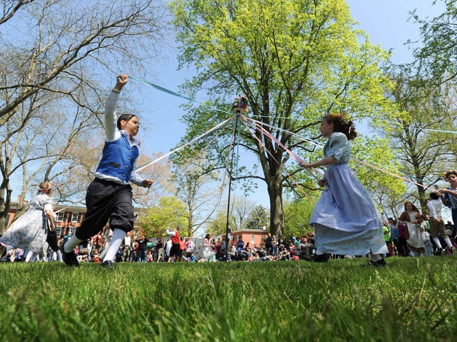 Students at the 81st Dover Days Festival perform a maypole dance in 2015.