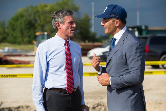Delaware Governor John Carney, left, speaks with Robert Buccini during the groundbreaking celebration for the 76ers Fieldhouse Wednesday near the Riverfront. The sports complex will be the new home for the 76ers NBA G League team the Delaware Blue Coats.