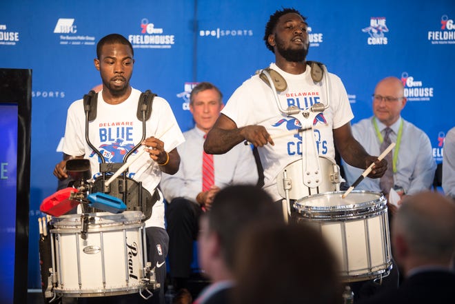 Members of the Philadelphia 76ers Drumstix drum line perform during the groundbreaking celebration for the 76ers Fieldhouse Wednesday near the Riverfront.