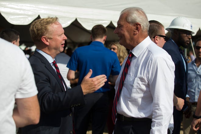 76ers President of Business Operations Chris Heck, left, speaks with Wilmington Mayor Mike Purzycki during the groundbreaking celebration for the 76ers Fieldhouse Wednesday near the Riverfront. The sports complex will be the new home for the 76ers NBA G League team the Delaware Blue Coats.