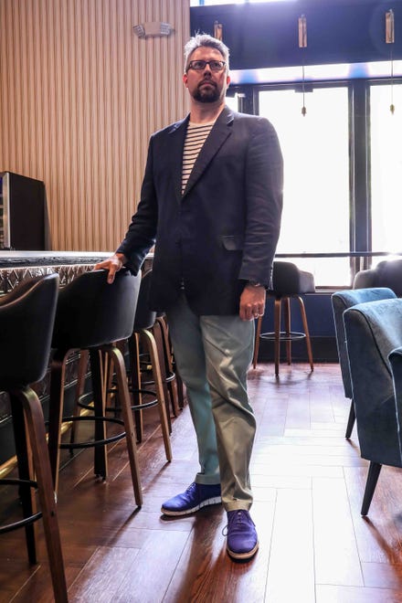 Gavin Bish wears a Breton striped tee by J Crew, sage chinos by Lands End, navy linen jacket by Jos A Bank and blue "Stitch Lite" Oxfords by Cole Haan.