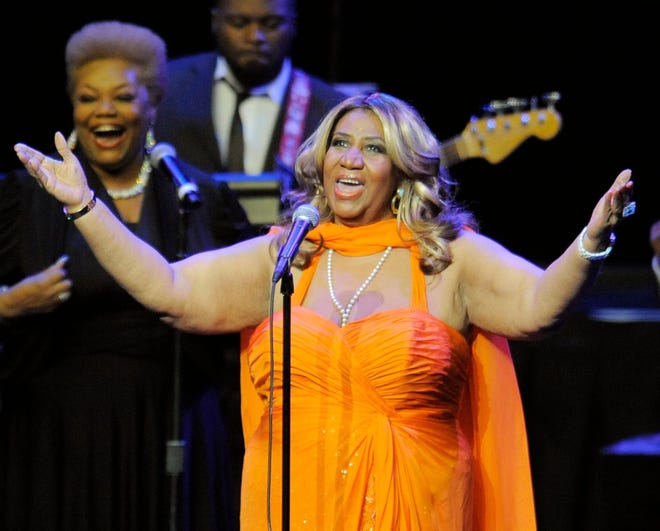 This July 25, 2012 file photo shows Aretha Franklin performing at the NOKIA Theatre L.A. LIVE in Los Angeles. Franklin sang for Mrs. Obama and about 3,000 fans at DAR Constitution Hall on Saturday, Nov. 17. Afterward, Franklin said it was great to see her VIP guests relax and shake their hips a little, especially after a tough reelection campaign.
