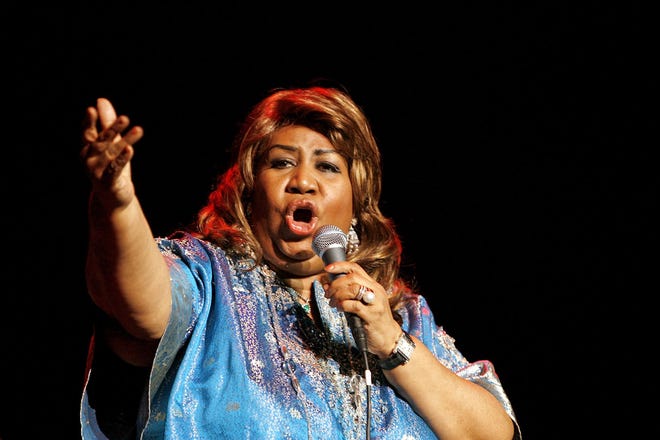 Aretha Franklin performs during a benefit concert at the Hammerstein Ballroom on Nov. 14, 2006 in New York. A musical based on her 1999 autobiography, "Aretha: From These Roots," will tour nationally, the Detroit Free Press reported Wednesday, Dec. 13, 2006.