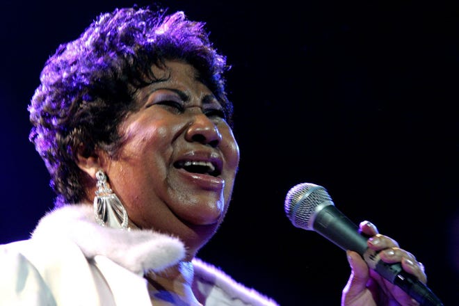 In this Nov. 21, 2008 file photo, Aretha Franklin performs at the House of Blues in Los Angeles.