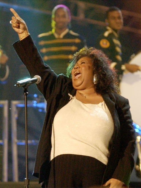 Aretha Franklin performs the national anthem on the Mall in Washington during "NFL Kickoff Live 2003" Thursday, Sept. 4, 2003, in Washington.