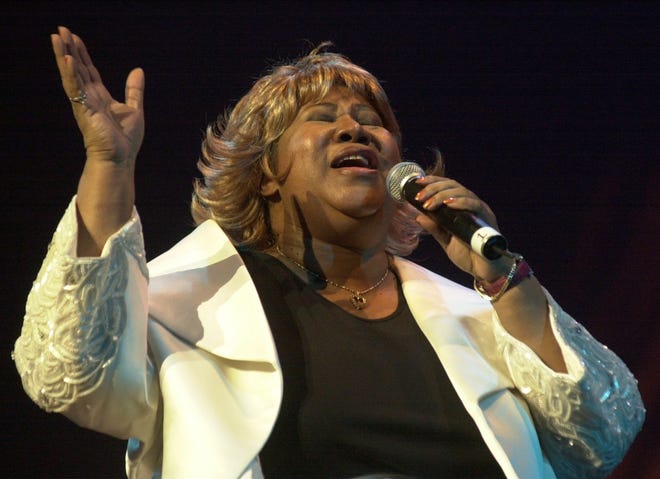 Singer Aretha Franklin performs at the Fox Theater in Detroit during the Southern Christian Leadership Conference's Dr. Martin Luther King. Jr. day celebration on Monday, Jan. 21, 2002.
