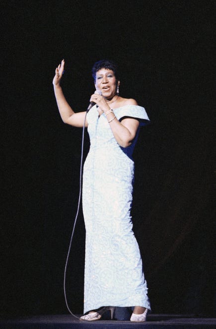 Aretha Franklin performs at New York's Radio City Music Hall, July 5, 1989. (AP Photo/Mario Suriani)