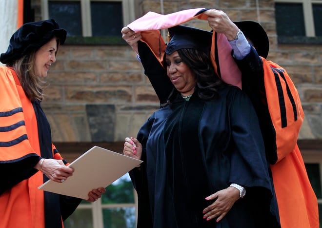 Soul singer Aretha Franklin stands on stage at Princeton University in Princeton, N.J., Tuesday, June 5, 2012, as the "Queen of Soul" receives an honorary Doctorate of Music degree during Princeton University's commencement. Following Princeton tradition, the identity of the honorary degree recipients was kept secret until the morning of the Ivy League school's commencement.