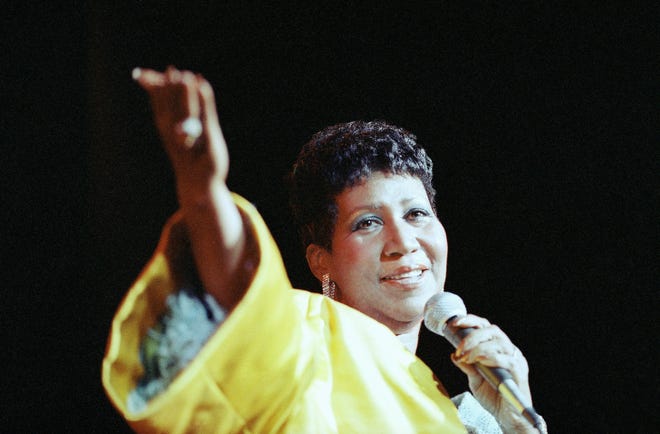 Entertainer Aretha Franklin performs at New York's Radio City Music Hall, July 6, 1989. (AP Photo/Mario Suriani)